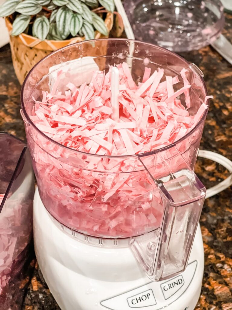shredded pink paper in food processor