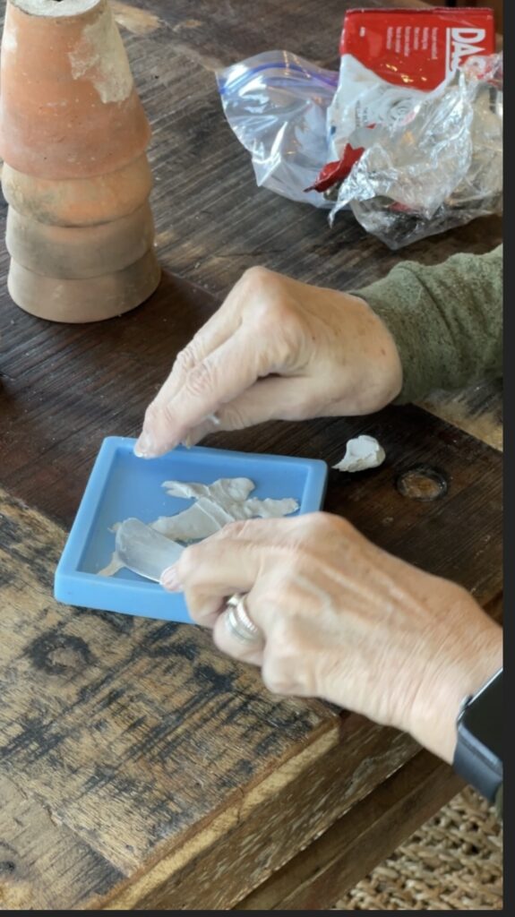 PUTTING CLAY INTO THE SILICON MOLD