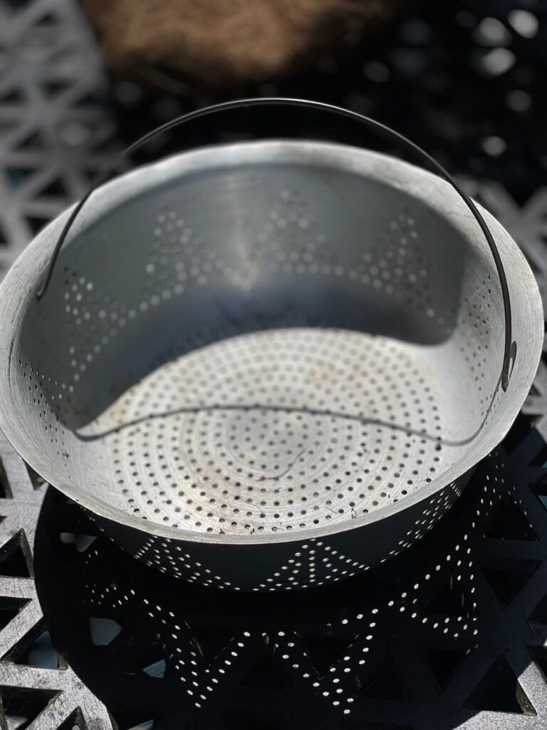 empty vintage colander