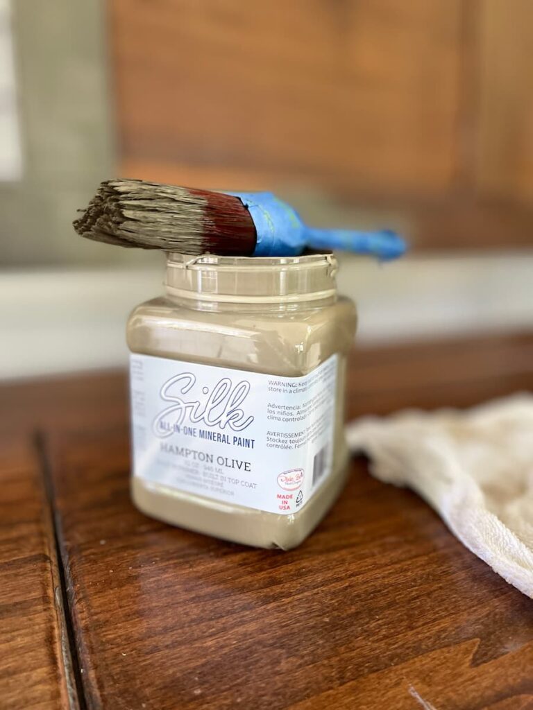 A JAR OF HAMPTON OLIVE PAINT