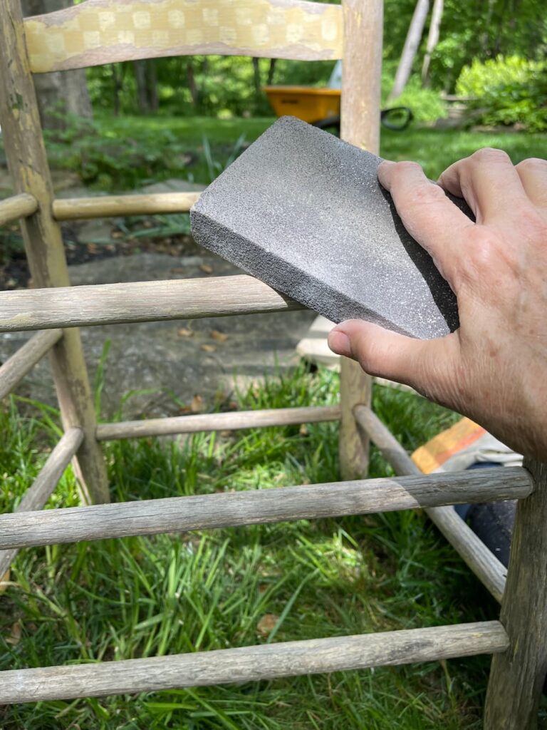 sanding the chair