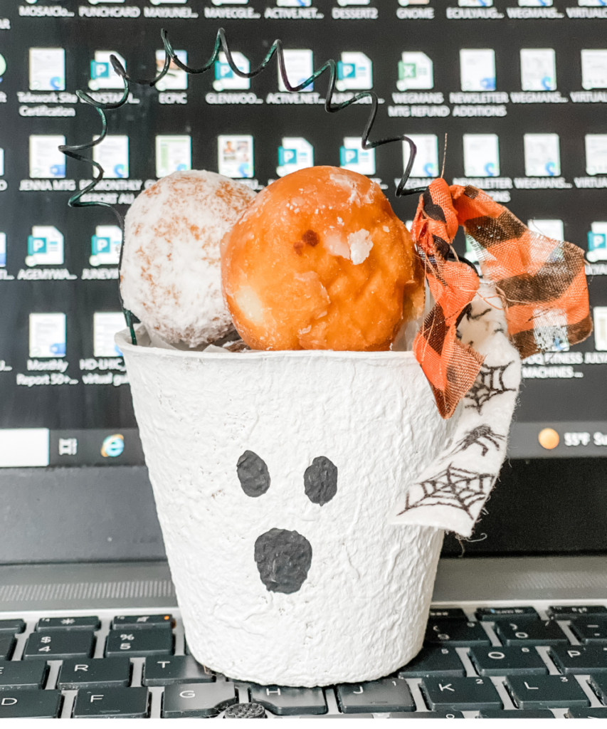 A GHOST PEAT POTS WITH DONUT HOLES